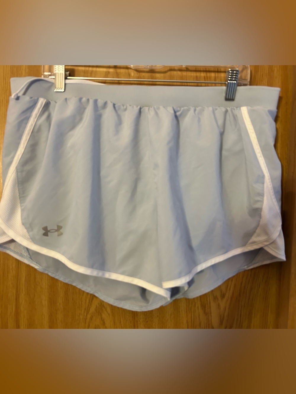 Under Armour Women’s Pale Blue Running Shorts with White Trim